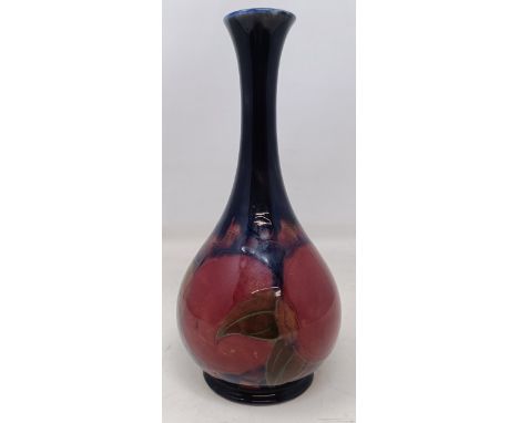 A Moorcroft Pottery pomegranate pattern baluster vase, 21 cm high