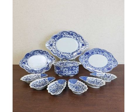 A part collection of a Chinese blue and white dinner service,late Qing dynasty, comprising:a bowl and cover, three meat dishe