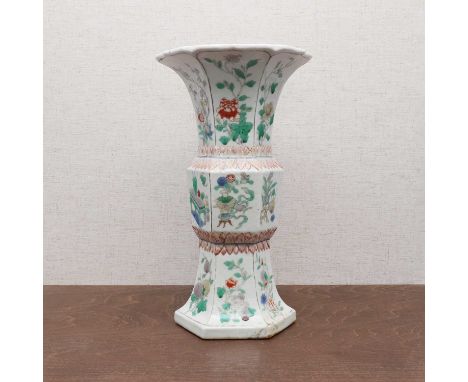 A Chinese famille verte vase,Guangxu (1875-1908), of lobed hexagonal form, painted with blossoming flowers or precious object