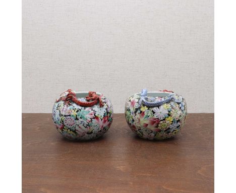 A pair of Chinese famille rose jars,Republic period (1912-1949), each of globular form painted with millefleurs pattern, moul