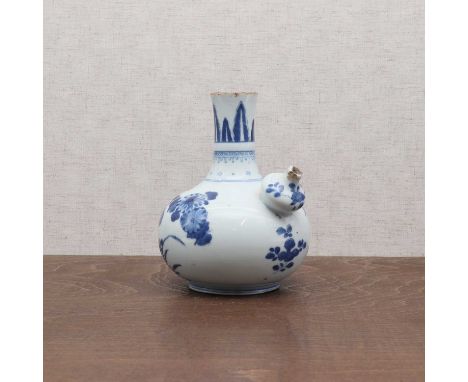 A Chinese blue and white kendi vase,Kangxi (1662-1722), the globular body rising from a circular foot to a waisted cylindrica