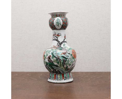 A Chinese famille verte vase,Republic period (1912-1949), the globular body rising from an octagonal foot, rising to a lobed 