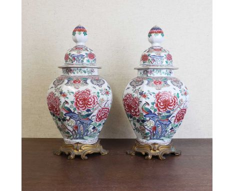 A pair of French Samson famille rose vases,19th-20th century, each of octagonal baluster form, painted with pheasants standin
