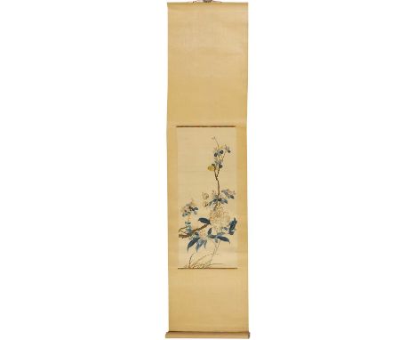 A Chinese hanging scroll,19th-20th century, embroidered with a bird perched on the branch of a blossoming prunus tree above a
