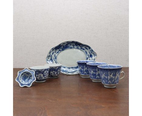 A collection of Chinese blue and white,late Qing dynasty, comprising:three coffee cups, of octagonal form, painted with vine 