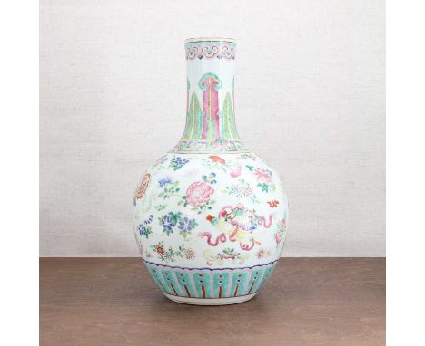 A Chinese famille rose vase, Guangxu (1875-1908), of globular form with a short straight neck, painted with Eight Buddhist Em