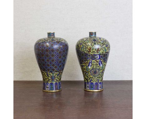 A pair of Chinese cloisonné vases, Qing dynasty (1644-1911), each tapering body sweeping up to a broad rounded shoulder, the 