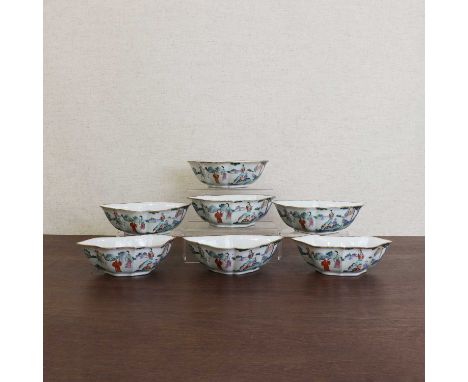 A collection of seven Chinese famille rose bowls,Guangxu (1875-1908), each of shaped form, painted with figures in a garden,2