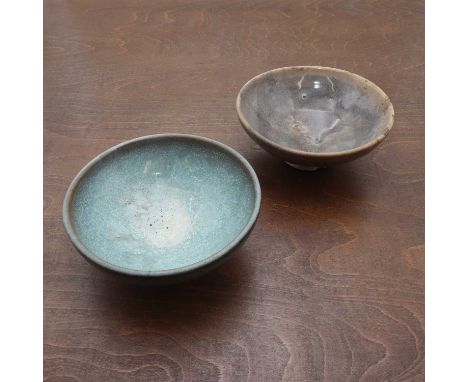 Two Chinese stoneware bowls,Song dynasty (960-1279), each sturdily potted with rounded sides rising from a circular foot, cov