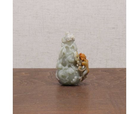 A Chinese jade double gourd vase,20th century, carved with five bats amongst tendrilled gourds with a chilong clambering up t