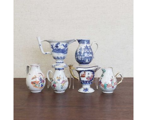 A collection of Chinese export milk jugs,18th century, comprising three blue and white, and three famille rose, painted with 