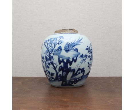 A Chinese blue and white jar and cover,Kangxi (1662-1722), of ovoid form, painted with pheasants surrounded by blossoming peo