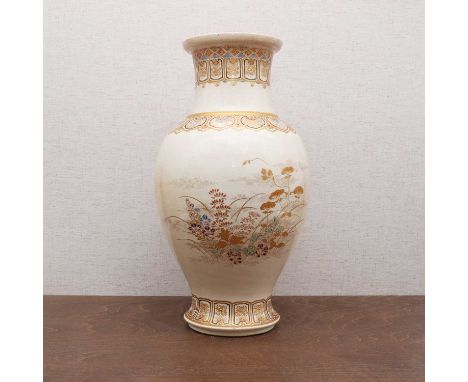 A Japanese Satsuma ware vase,c.1900, of baluster form, painted with a butterfly and flowers between two horizontal lappet ban