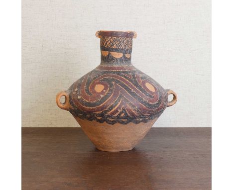A Chinese pottery jar,Neolithic period (c.6500-1700 BC), the tapering body rising to a cylindrical neck with twin loop handle