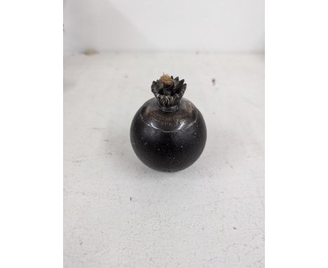 A late 19th/early 20th century Boer War grenade converted to a table lighter with a silver rim Location:If there is no condit