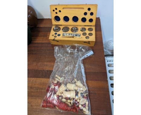 A boxed set of weights, part complete and a collection of chess piecesLocation:If there is no condition report, please reques