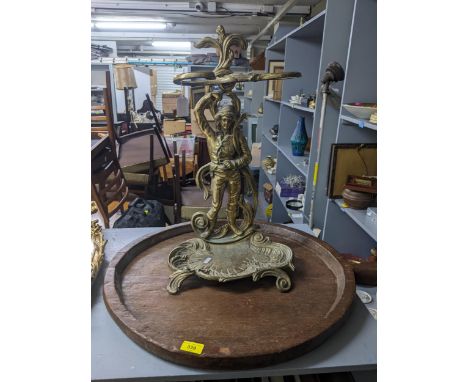 A 20th century Victorian style brass figural stick/umbrella stand; along with a large oval African wooden tray, 73cms long.Lo