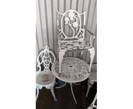 A selection of cast metal garden white painted furniture to include four chairs, circular table and low table Location: R Con