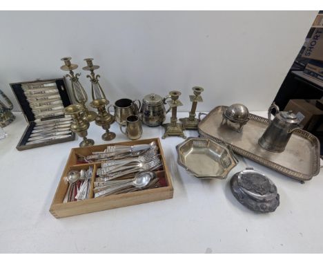 A mixed lot of metalware to include a late 19th century a three piece tea service having chased and engraved decoration along