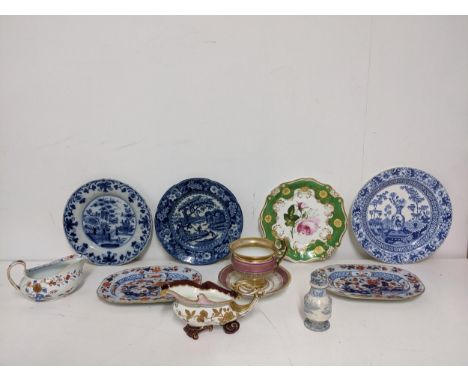A selection of 18th and 19th century continental and English ceramics to include, a French Empire style breakfast cup and sau