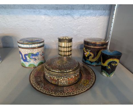 A mixed lot of enamel ware to include a Chinese cloisonne dragon pot and cover, along with others Location:If there is no con