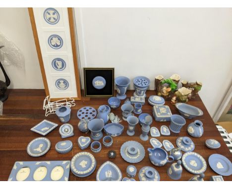 Wedgwood Jasperware items to include lidded trinket dishes, candleholders, vases, bells, a picture frame and other items, alo
