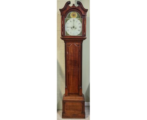A George III mahogany 8 day longcase clock, the case having a broken swan pediment with two turned pillars flanking the arche