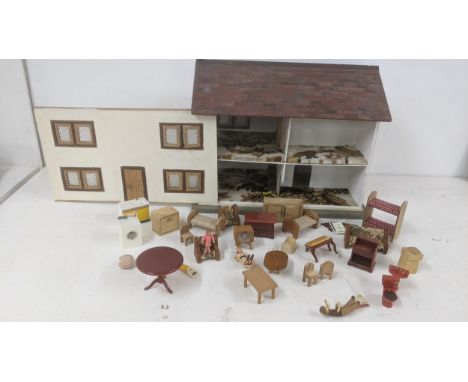 A vintage wooden doll's house, along with doll's house furniture Location: 7-3If there is no condition report shown, please r