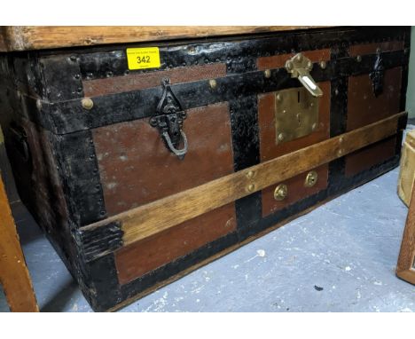 An early 20th century metal and wood bound, leather clad trunk, 31 x 71 x 46Location: GIf there is no condition report shown,