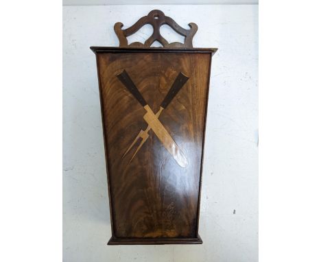 An oak wall hanging candle box with an inlay depicting a knife and fork with pierced and carved raised backLocation: A1FIf th