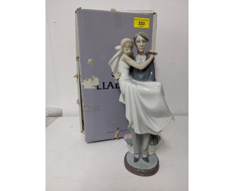 "Over The Threshold" - A Lladro figurine of a couple after being married, boxed.Location: G2If there is no condition report s