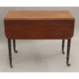 A Victorian mahogany Pembroke table. 50 cm wide flaps down.