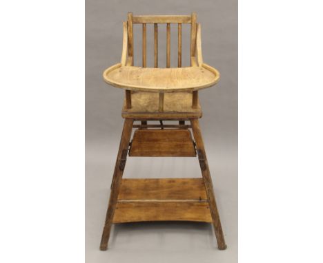 A vintage child's high chair. 92 cm high.