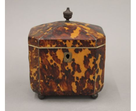 A 19th century tortoiseshell tea caddy. 10.5 cm high.