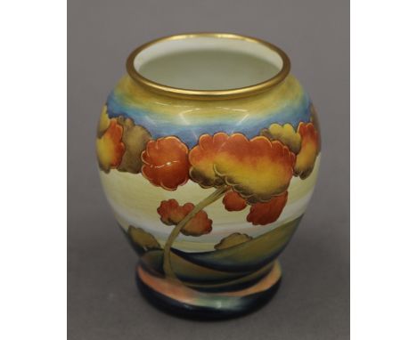 A small modern Moorcroft enamel vase. 7.5 cm high.