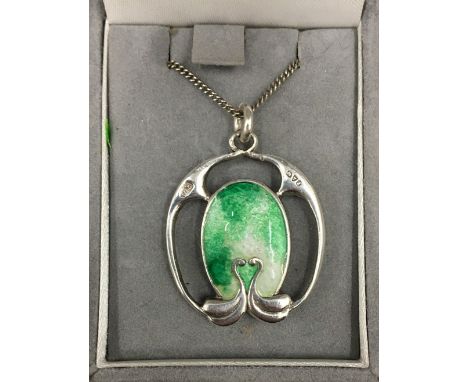An Arts and Crafts silver and enamel pendant by Charles Horner, hallmarks for Chester 1909, on a later silver chain. The pend