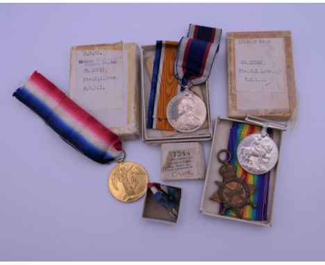 A set of four WWI medals awarded to Pte J E Lowe RMLI, (Royal Marines Light Infantry), CH12242, including a Naval Long Servic