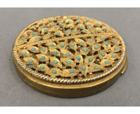 An Art Nouveau compact. 7 cm diameter.