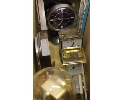 A quantity of various clocks and a barometer.