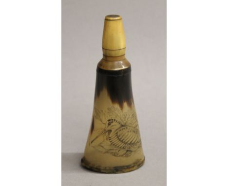 A 19th century horn shot flask, engraved with a snipe. 16 cm high.