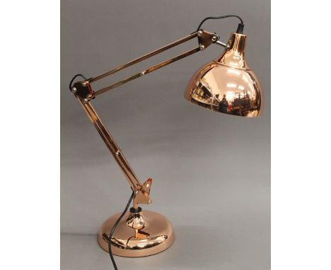 A copper anglepoise lamp. 