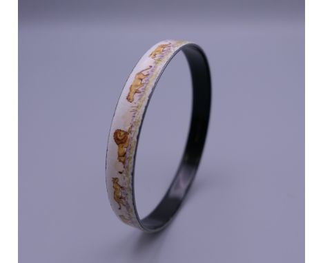 A Hermes enamel decorated bangle. 6.5 cm wide.