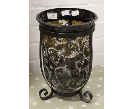 A decorative glass storm lamp on stand. 28 cm high.