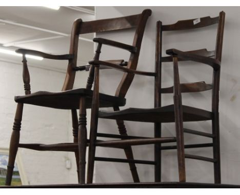 An early 20th century ladder back armchair and a 19th century elm seated open armchair