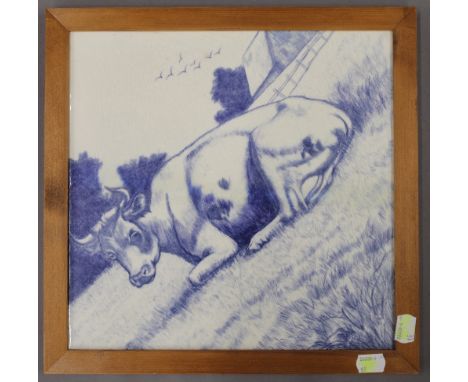 A Victorian butchers shop tile depicting a cow, framed. 34 x 33.5 cm.