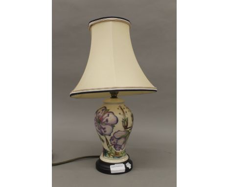 A Moorcroft Meadow Cranesbill table lamp by Alicia Amison, with matching silk shade. Her first design for Moorcroft around 20