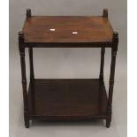 A 19th century mahogany two tier whatnot. 59.5 cm high.