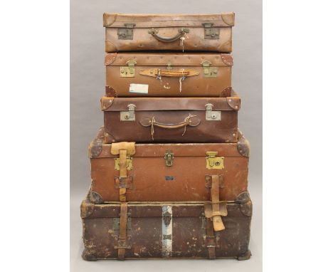 A collection of vintage trunks and cases. 