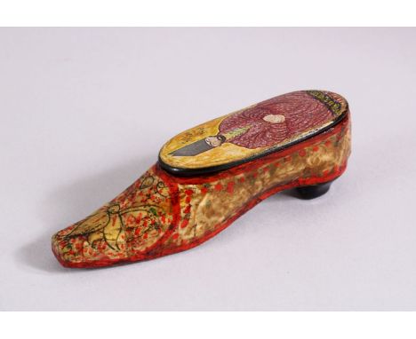 AN UNUSUAL PERSIAN LACQUER PAPIER MACHE SHOE SHAPED SNUFF BOX, The top with the view of a figure, 9cm.
