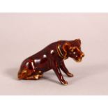 A SMALL CHINESE PORCELAIN FIGURE OF A DOG - 8CM